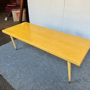 61&quot; Wide Affordable Drexel Style Mid Century Modern Vintage Solid Very Thick Wood Plank Mustard Coffee Table w/ Tapered Legs n Brass Aprons