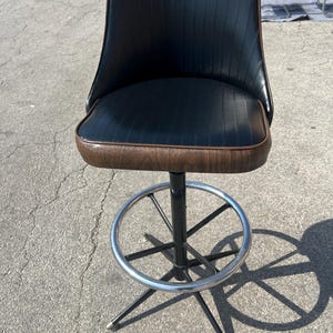 Vintage Mid Century Modern Swivel Bar Stool: Black Faux Leather, Chrome Foot Rest