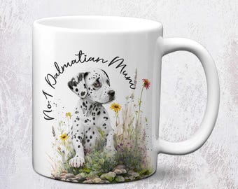 May include: White ceramic mug featuring a Dalmatian puppy illustration surrounded by wildflowers. The mug has the text "No. 1 Dalmatian Mum" in a handwritten font. The handle is white.