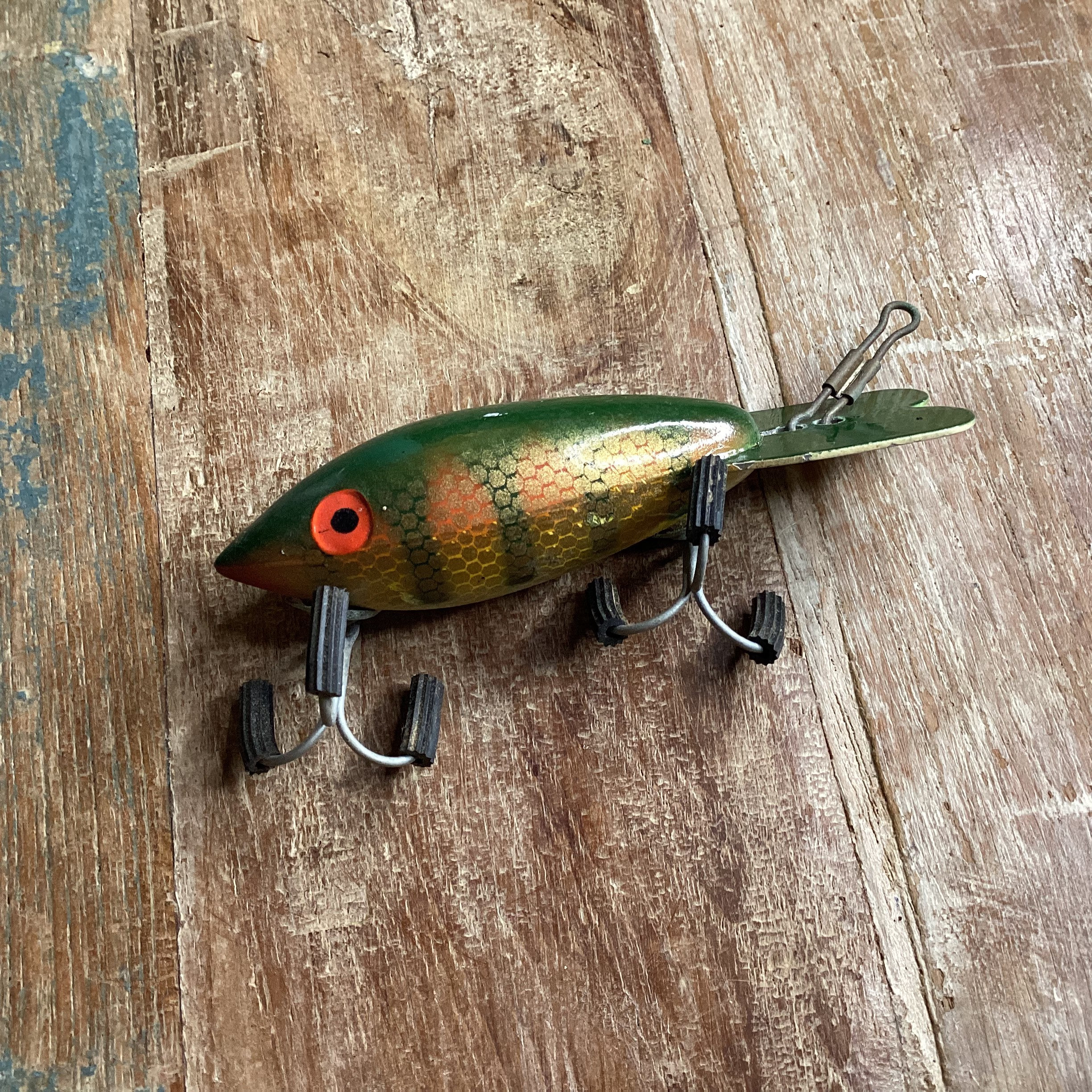 Vintage wooden fishing lure ~ hand painted green orange gold scale fish ~  LUXON Bomber Bait Company outdoor recreation collectible