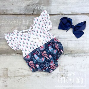 6-9/18-24 month:  Cluck Cluck Cutie Baby Girls Ruffled Floral and Hen Print Romper/Bubble