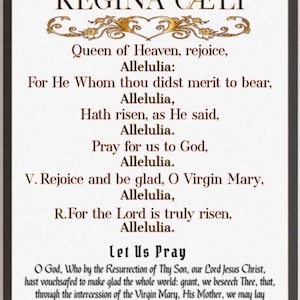 Può includere: Una stampa incorniciata di una preghiera cattolica, "Regina Cæli", in una cornice dorata e bianca. La preghiera è scritta in testo nero su sfondo bianco. Il testo include le parole "Regina del Cielo, rallegrati" e "Alleluia".