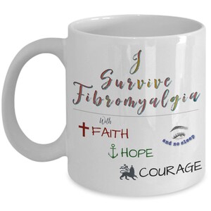 May include: White ceramic coffee mug with the text "I Survive Fibromyalgia with FAITH, HOPE, and no sleep, COURAGE".