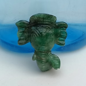 Emerald Garnet Gemstone Carving Natural Untreated Emerald Hand Carved Ganesha Idol In Natural Emerald Ganesha head