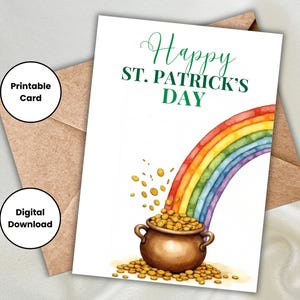 May include: A St. Patrick's Day greeting card with a watercolor illustration. The card features a rainbow arching over a pot of gold, with the words "Happy St. Patrick's Day" in green script. The card is on a brown envelope.
