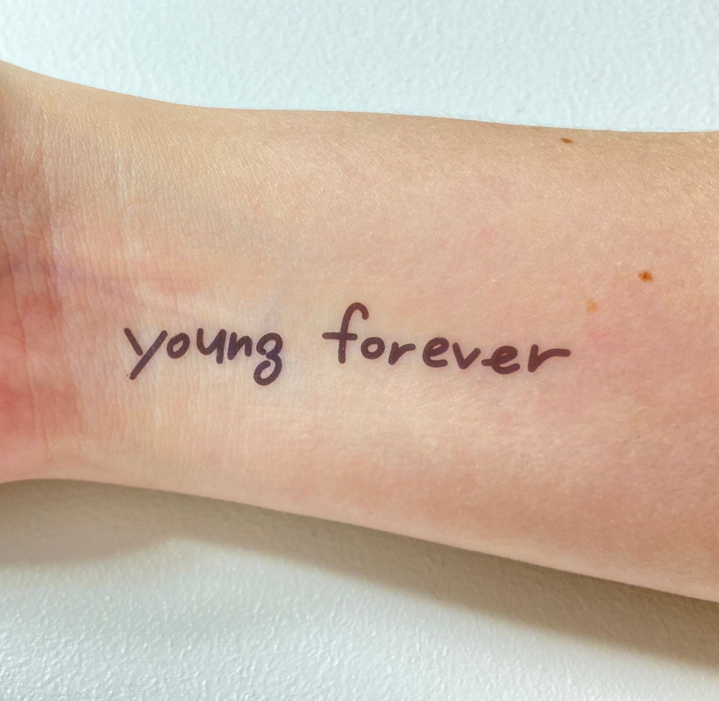 Forever young tattoo ideas
