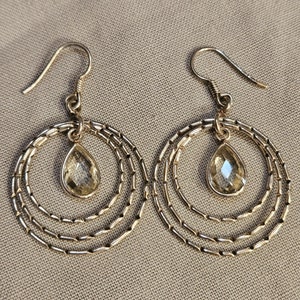 Sterling silver circle hoop earrings with green stones. 1-3/4&quot; long. &quot;India, 925&quot;