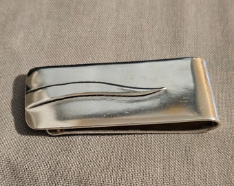 Sterling silver money clip. Taxco Mexico; 2" long. 22.6 grams