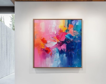 Könnte beinhalten: Ein quadratisches abstraktes Gemälde in einem Holzrahmen mit dicken, strukturierten Pinselstrichen. Die Komposition zeigt eine lebendige Farbpalette aus leuchtendem Pink, tiefem Blau, Orange, Gelb und Weiß, die eine dynamische Mischung erzeugt.