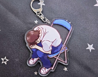 Llavero acrílico de Shinji deprimido en silla