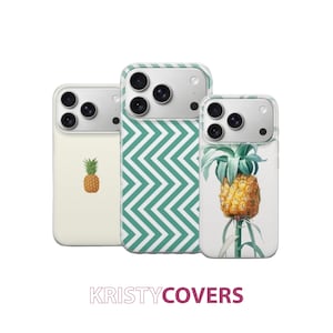 May include: Three phone cases with various designs. One features a small pineapple, another has a teal and white chevron pattern, and the third showcases a detailed pineapple illustration. The cases are white with silver camera surrounds. The text "KRISTYCOVERS" is at the bottom.