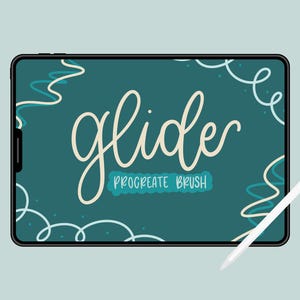 May include: A teal iPad screen with the word "glide" written in a white cursive font. The text "Procreate Brush" is written in white below the word "glide". The screen is surrounded by a black frame. A white Apple Pencil is lying on a light blue surface next to the iPad.