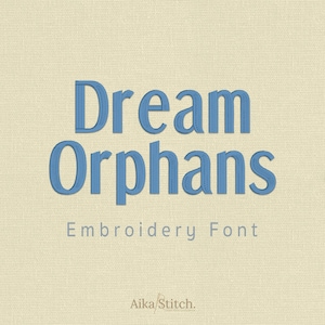 May include: The text Dream Orphans is displayed in a blue, textured embroidery font style against a light beige, woven fabric background. Below this, the words Embroidery Font appear in a smaller, grey font, with Aika Stitch at the bottom.