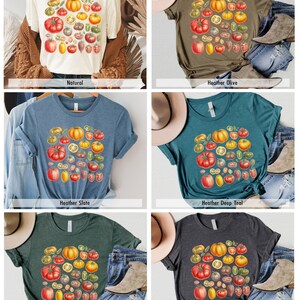 May include: A t-shirt with a vintage illustration of tomatoes, peppers, and other vegetables. The shirt is available in six colors: natural, heather olive, heather slate, heather deep teal, heather forest, and dark grey heather.