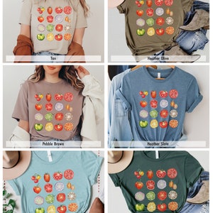 May include: A t-shirt with a graphic of sliced tomatoes, limes, and onions. The shirt is available in six colors: tan, heather olive, pebble brown, heather slate, heather ice blue, and forest.