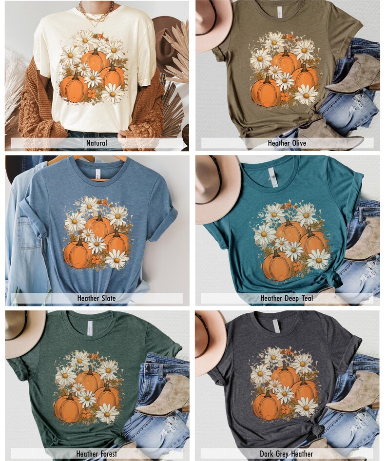 May include: Six different color t-shirts with a graphic print of pumpkins and daisies. The colors are natural, heather olive, heather slate, heather deep teal, heather forest, and dark grey heather.