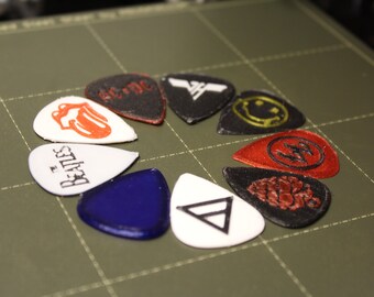 Guitar picks - A pack of six guitar picks / plectrums inspired by famous bands