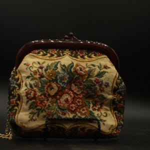 Preciosa cartera con diseño de tapiz