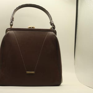 Graceline - Cartera con asa superior en color marrón chocolate