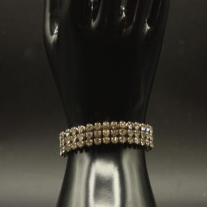 Pulsera flexible de tres hilos con brillantes diamantes de imitación transparentes