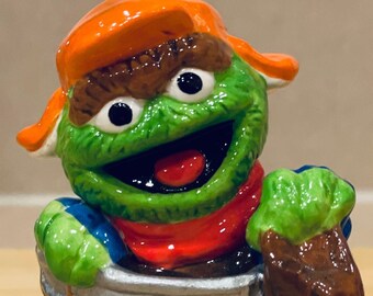 Oscar, 1990s Sesame Street wintertime fun figurine by Enesco