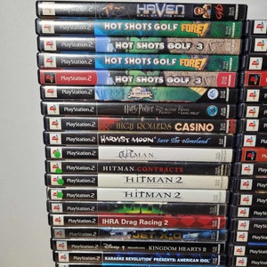 May include: A stack of PlayStation 2 video game cases, including titles like Haven, Hot Shots Golf, Harry Potter, High Rollers Casino, Harvest Moon, Hitman, Kingdom Hearts II, and Lord of the Rings.