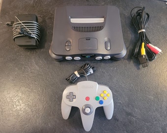 Console Nintendo 64 + manette(s) + câbles *Testé et fonctionnel* *Bon état* *Authentique*