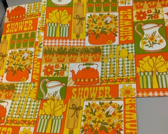 May include: A retro patterned fabric featuring a repeating design with orange teapots, flowers, and the word "SHOWER" in white. The pattern also includes yellow gift boxes, rolling pins, and cutlery, set against a colourful background.