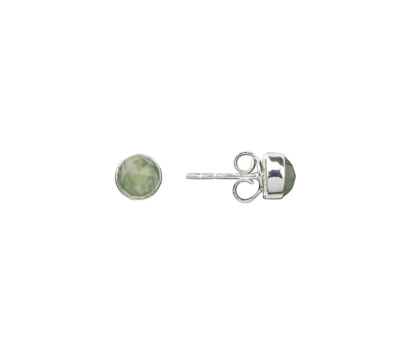 May include: A pair of silver stud earrings with a light green gemstone in each. The earrings have a post and butterfly back.