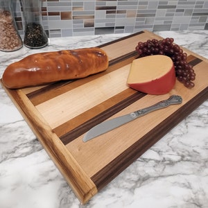 Handmade Farmhouse Chic Cutting Board Made of Walnut, Maple, and Cherry  18 x 11 x .75 Perfect for Housewarming Gift or Christmas Gift Idea