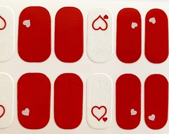 May include: Set of 10 red and white nail wraps with a heart design. The nail wraps are designed to fit different nail sizes.