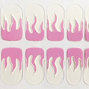 May include: Pink and white nail stickers with a flame design. The stickers are arranged in two rows of ten.