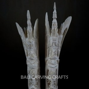 Set of two carved Balinese figurine of cow bone, Hand carved beautiful bone statue  home decoration, and carved beautiful bone sculpture