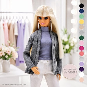 May include: A fashion doll with long blonde hair and bangs, wearing a grey open-front blazer over a light purple turtleneck sweater and white trousers. The doll features silver earrings and is presented alongside a vertical colour palette chart.