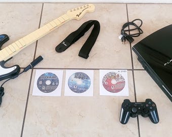 PS3 Console Bundle + Rock Band Guitar Hero Wired Controller + Adapter + 3 Games Aerosmith
