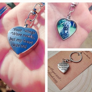 May include: Silver heart-shaped keychain with a photo of a dog and the inscription "Your wings were ready, but my heart was not".