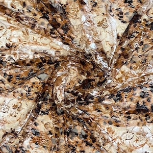 Tissu dentelle extensible multicolore floral marron et crème - l'mètre