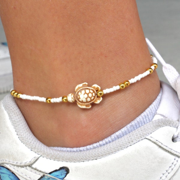 White and gold turtle anklet