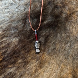 horseshoe nail amulet