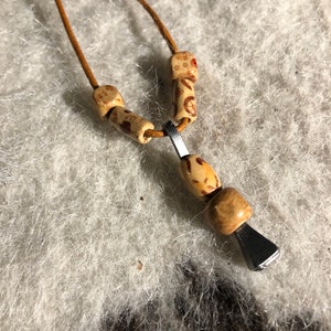 horseshoe nail amulet