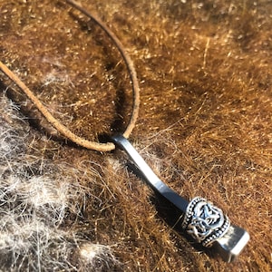 horseshoe nail amulet
