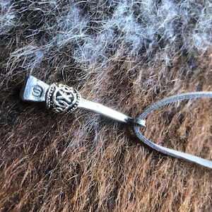 horseshoe nail amulet