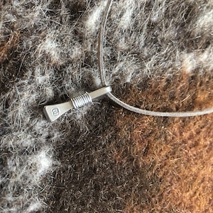 horseshoe nail amulet