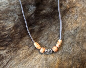 amulet with pearls
