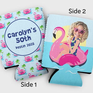 May include: Two beverage insulators. One features a pattern of pink flamingos and palm trees with text that reads "Carolyn's 50th Destin 2025". The other shows a person on a pink flamingo floatie with sunglasses. The background is blue.