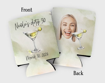 May include: A green and white can cooler with a watercolor design. The front features a martini glass with an olive and the text "Nicole's dirty 30 March 10, 2024". The back features a photo of a woman's face.