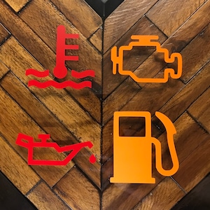 May include: A white ceramic mug with a black handle and the text "But First, Coffee" in a handwritten style. The mug is on a white surface. The mug is approximately 4 inches tall.