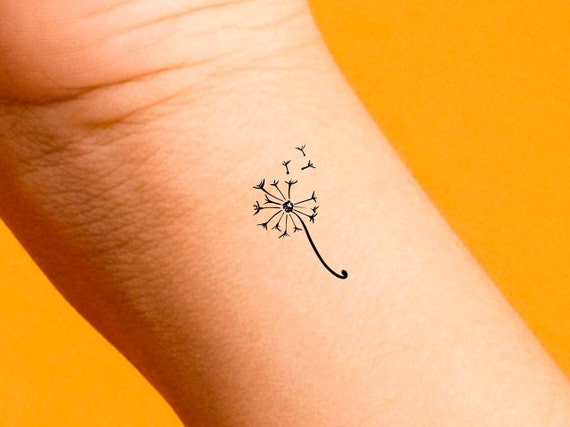 Fine line style dandelion tattoo on the back of... - Official Tumblr page  for Tattoofilter for Men and Women