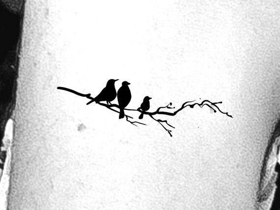 Black silhouette of mockingbird sitting on the branch. | Bird silhouette,  Bird silhouette tattoos, Silhouette tattoos