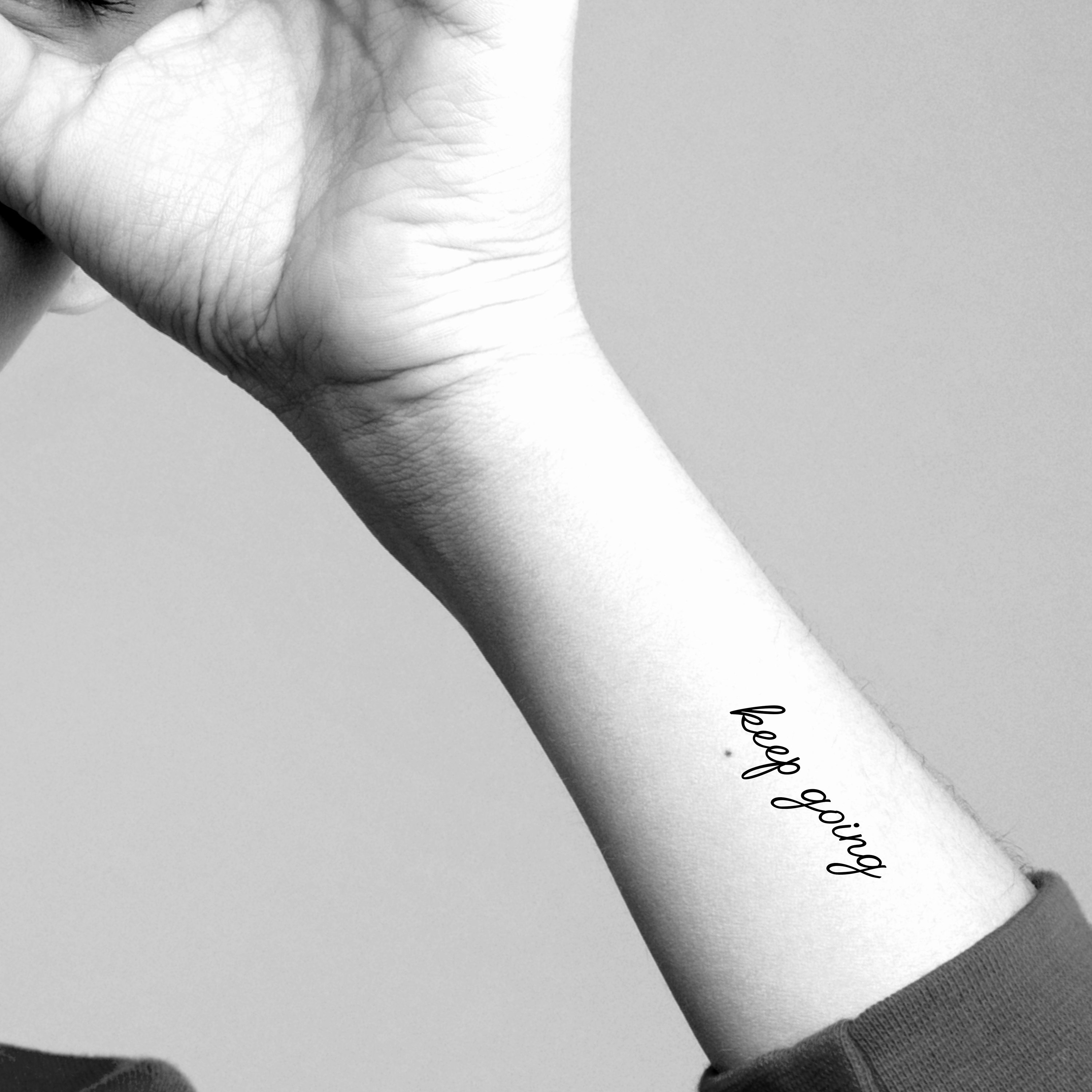 Keep Going Wrist Tattoo - Simple & Strong